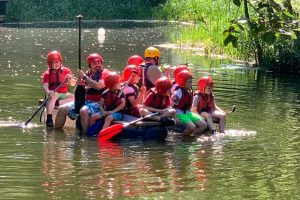 Cubs floating on a self-made raft